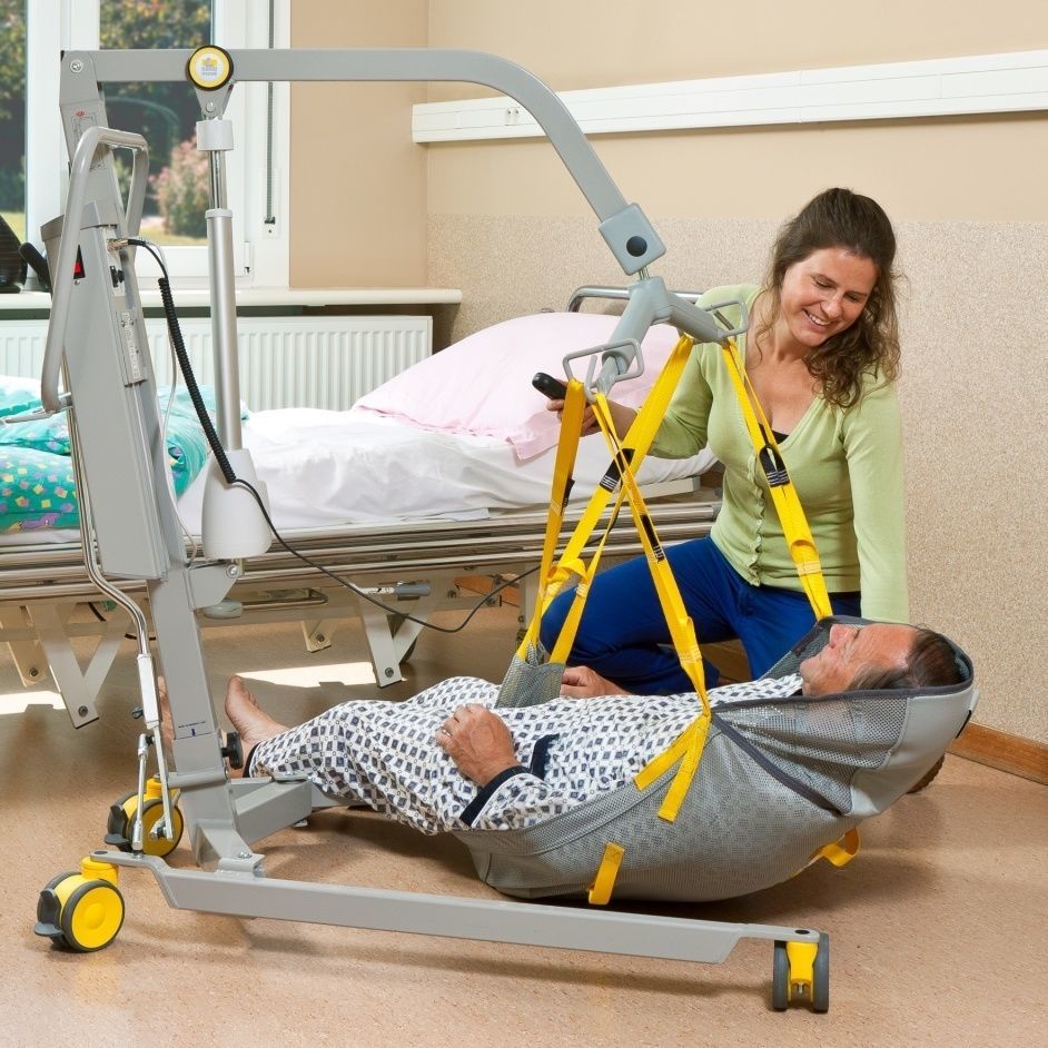 Elektrischer Patientenlifter 1630 Handi Move auf Rollen für