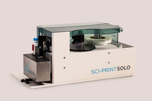 Reagensgläser-Etikettierer - Sci-Print SOLO - Scinomix, Inc - für Ampullen / für die Pharmaindustrie / halbautomatisch