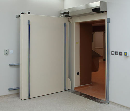 Tür mit Abschirmung - Woodmans Meditech - für Strahlentherapie / für Nuklearmedizin / einflügelig