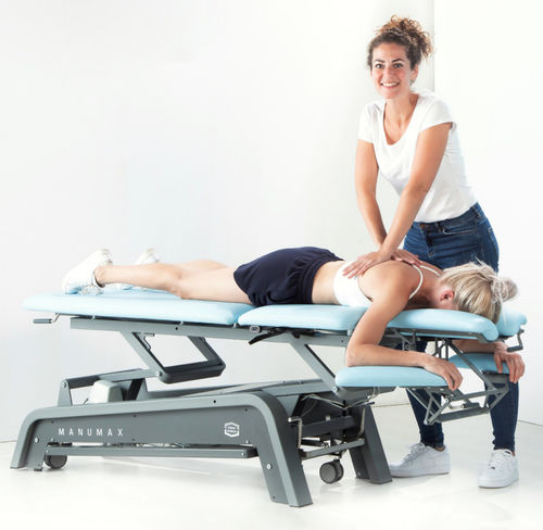 Elektrische Massageliege - ManuMax Multi - Enraf-Nonius - auf Rollen / mit Kopfstütze / mit Armstütze