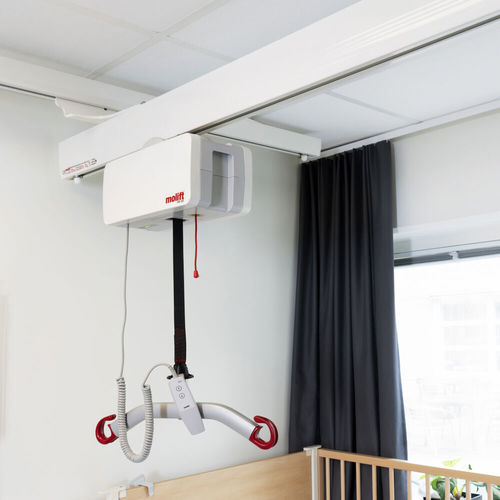Elektrischer Patientenlifter - Etac - deckenmontiert / schienenmontiert / für Badewanne