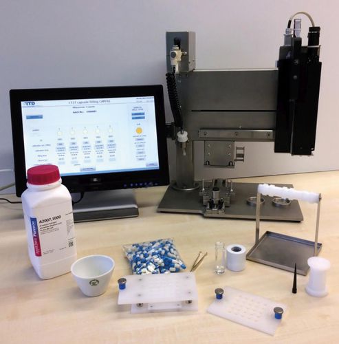Füllmaschinen für Kapseln - Kapselabfüllung - Isotope Technologies Dresden 