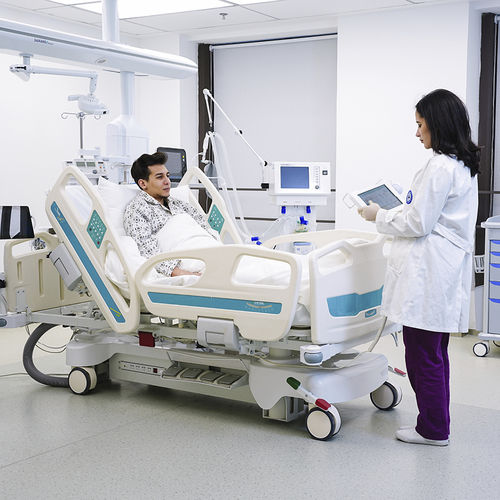Krankenhausbett - Jiangsu Saikang Medical Equipment - elektrisch / höhenverstellbar / auf Rollen