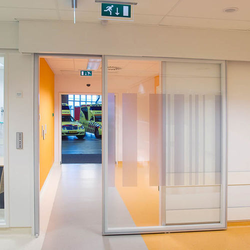 Tür für Gesundheitseinrichtungen - Medicare - Metaflex Doors Europe - für Reinraum / für die Pharmaindustrie / Schiebe